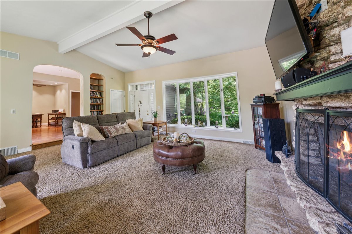 2N989 Beith Road Elburn, IL 60119 - Photo 8 of 35 a living room with furniture and a fireplace