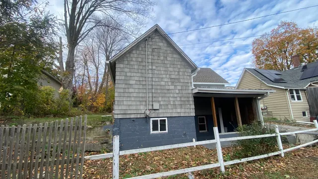 a front view of a house with a porch