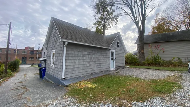 a backyard of a house with lots of green space