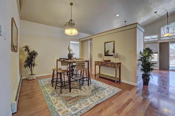 a view of a dining room with furniture