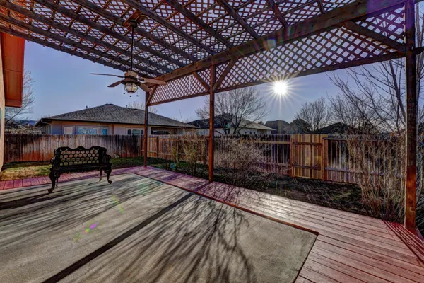 a view of a backyard with a deck