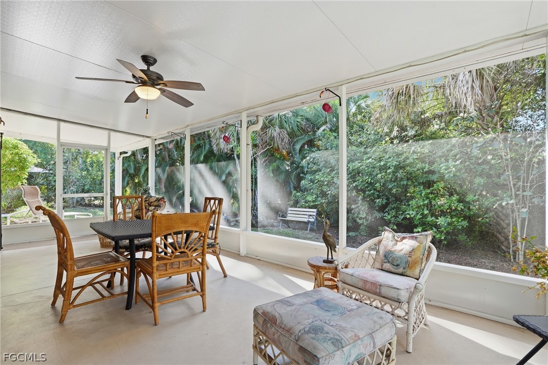 10730 Rio Mar Circle Estero, FL 33928 - Photo 26 of 47 a dining room with furniture window and outside view