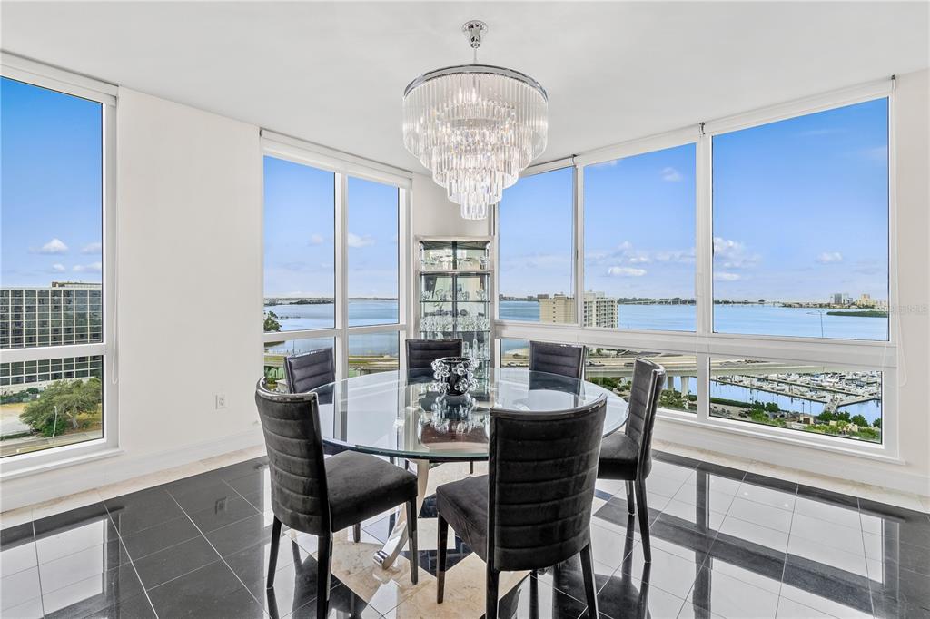 331 Cleveland Street, Unit 1103 Clearwater, FL 33755 - Photo 16 of 75 a view of a dining room with furniture window and outside view