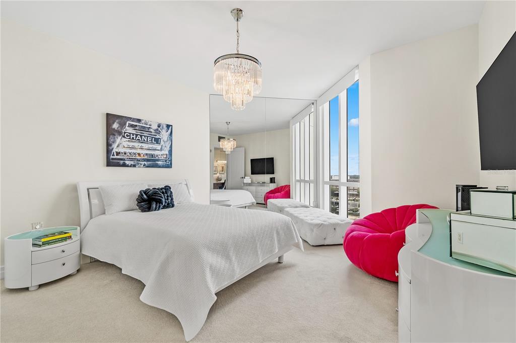 331 Cleveland Street, Unit 1103 Clearwater, FL 33755 - Photo 36 of 75 a bedroom with bed and window