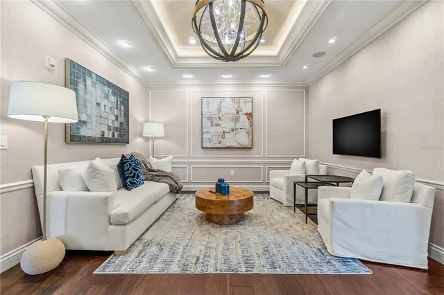 a living room with furniture and a rug