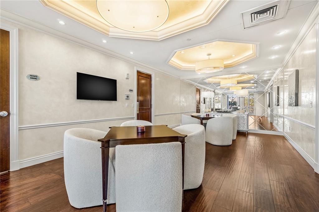 331 Cleveland Street, Unit 1103 Clearwater, FL 33755 - Photo 50 of 75 a view of a livingroom with furniture and a flat screen tv
