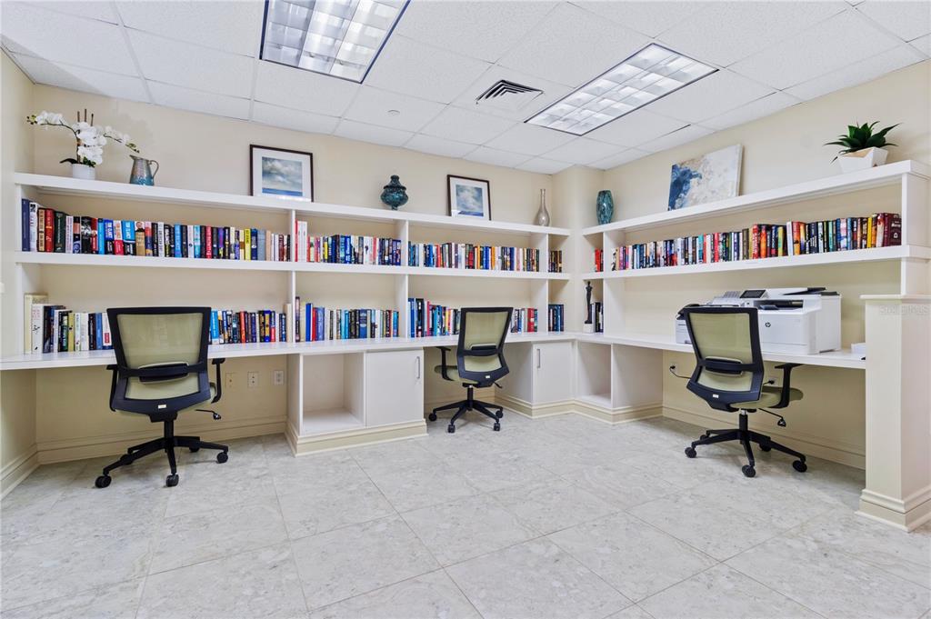 331 Cleveland Street, Unit 1103 Clearwater, FL 33755 - Photo 67 of 75 a view of a livingroom with workspace and a large window