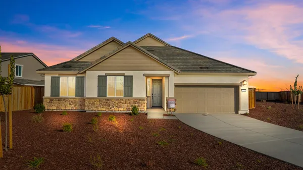 a view of a house with a patio