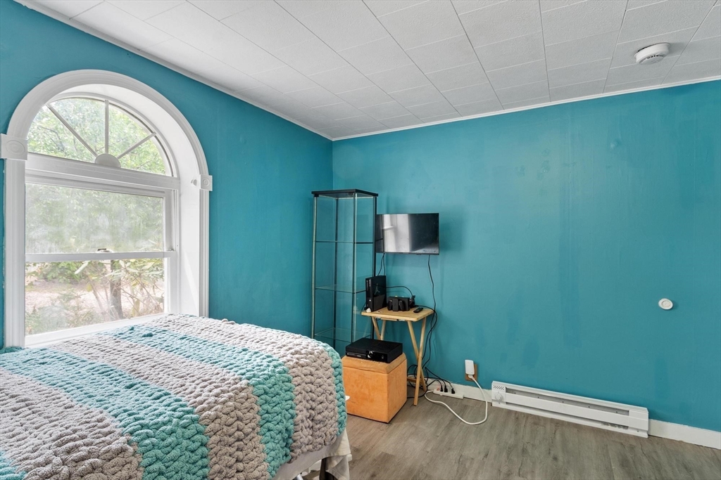 144 Bailey Road Holden, MA 01520 - Photo 29 of 42 a bedroom with a bed and a window
