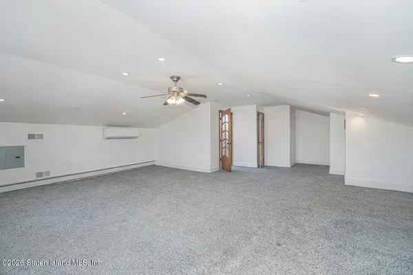 a view of a room with racks on the wall
