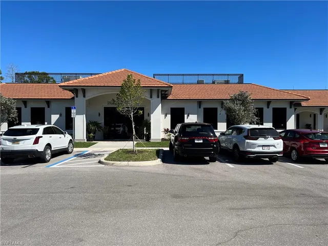 a car parked in front of a building