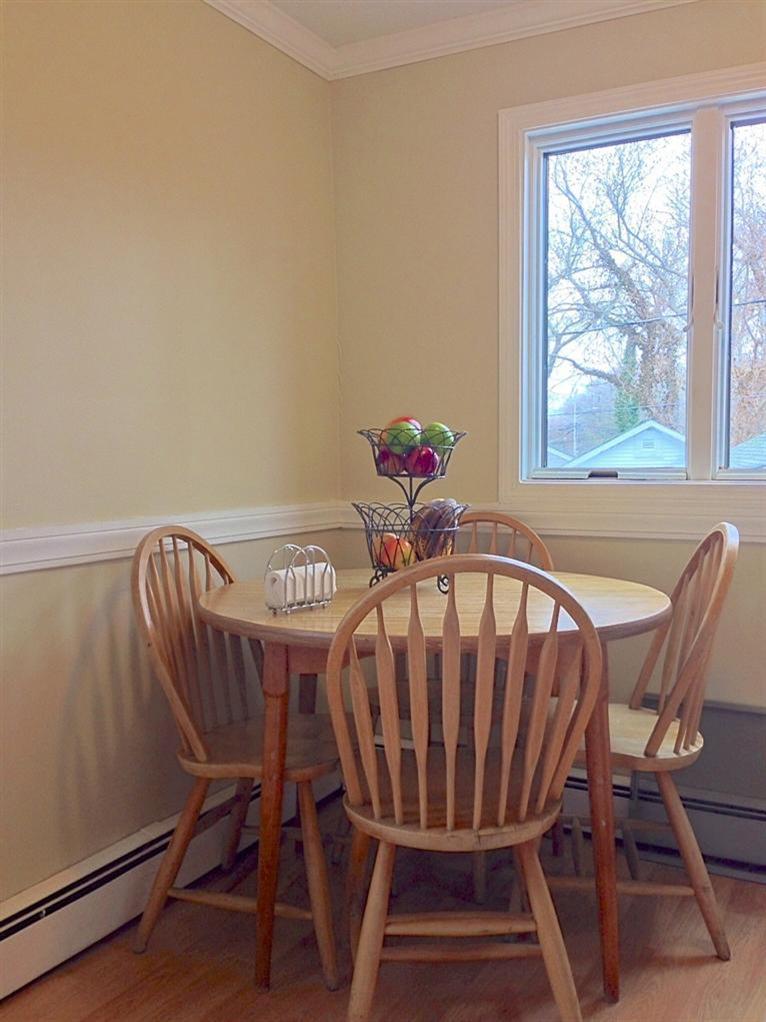 46 Oak Neck Road Hyannis, MA 02601 - Photo 11 of 21 a view of a dining room with furniture window and outside view
