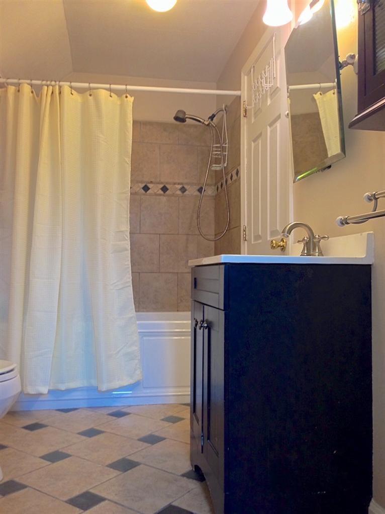 46 Oak Neck Road Hyannis, MA 02601 - Photo 16 of 21 a bathroom with a sink and a mirror