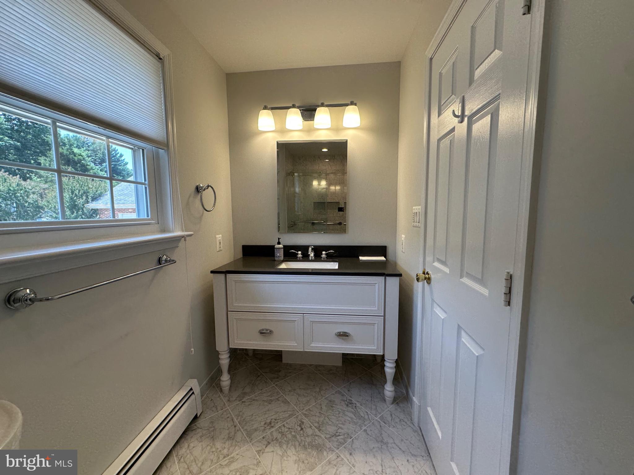 14616 Sturtevant Road Silver Spring, MD 20905 - Photo 24 of 44 Bathroom 3-Bright and airy modern bathroom retreat