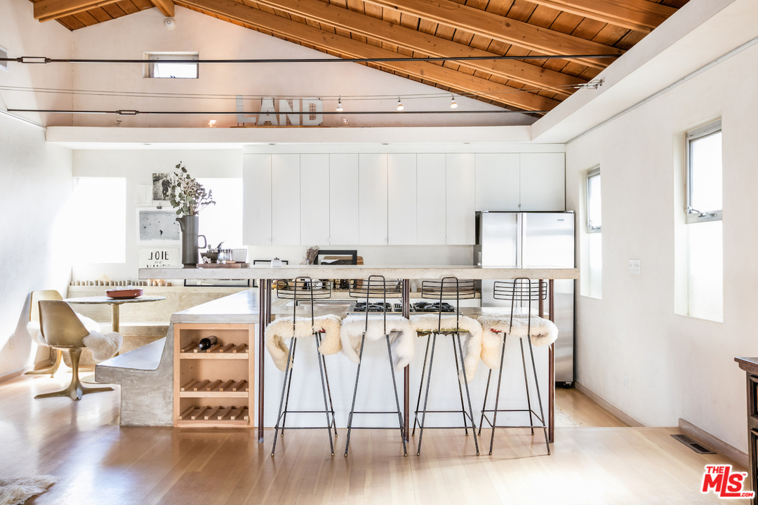 650 Sunset Avenue Venice, CA 90291 - Photo 3 of 20 a view of a kitchen with furniture and wooden floor