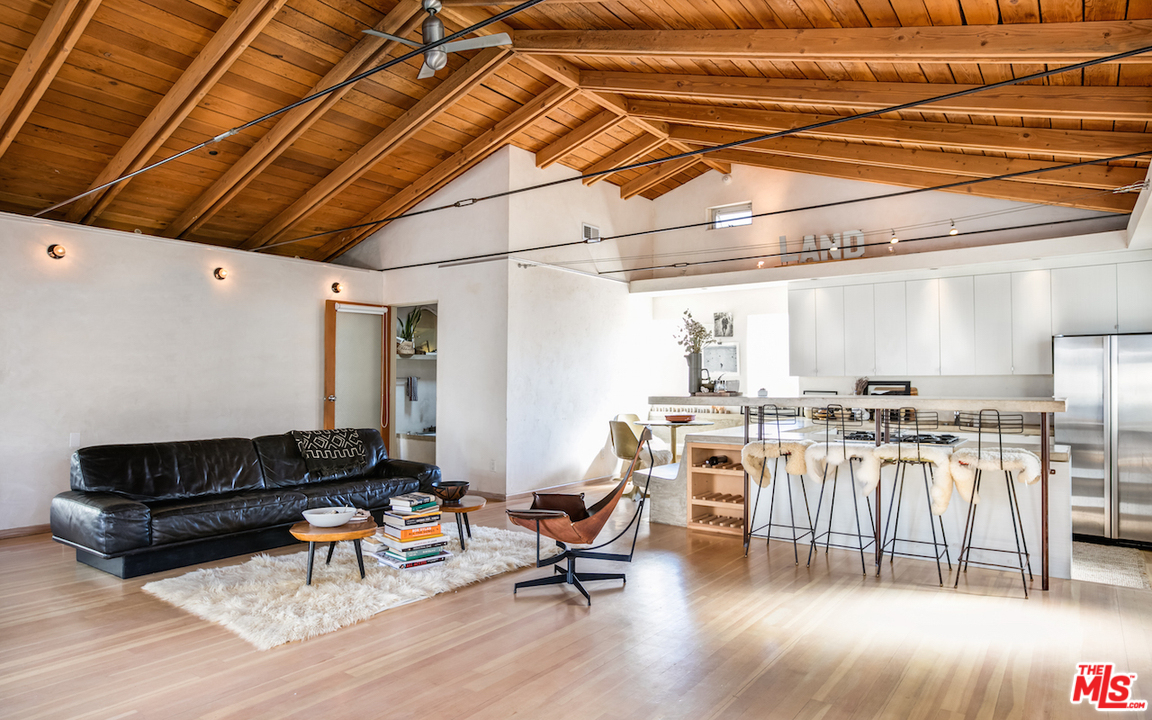 650 Sunset Avenue Venice, CA 90291 - Photo 5 of 20 a living room with lots of furniture and a wooden floor