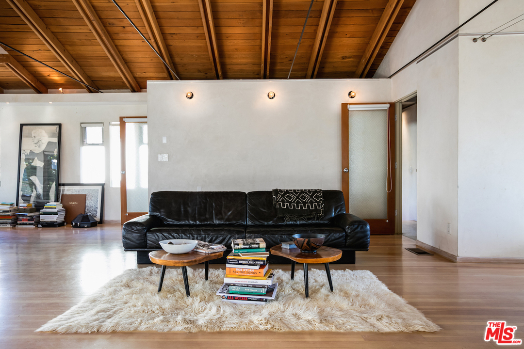 650 Sunset Avenue Venice, CA 90291 - Photo 8 of 20 a living room with furniture a rug and a table