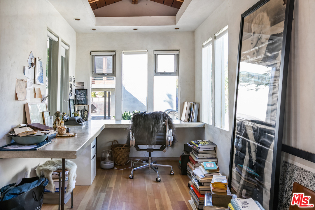 650 Sunset Avenue Venice, CA 90291 - Photo 10 of 20 a view of a workspace with furniture and a window