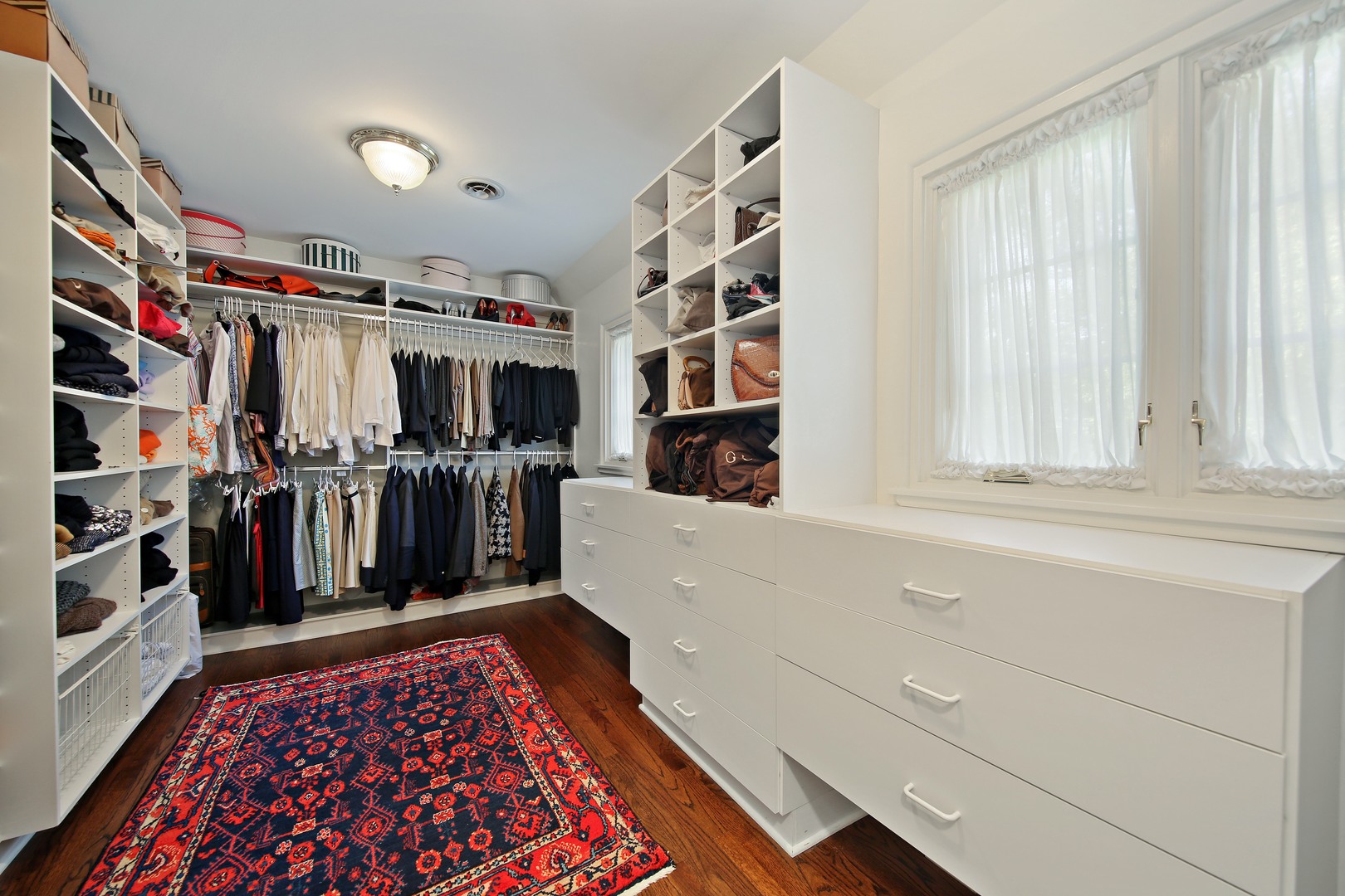 712 Taft Road Hinsdale, IL 60521 - Photo 17 of 25 a view of walk in closet with clothes and shoes