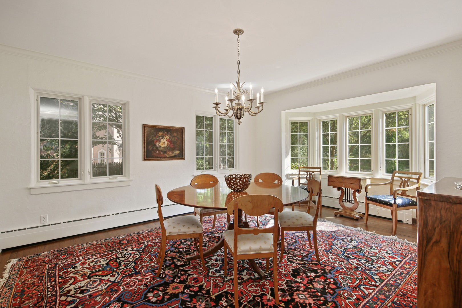 712 Taft Road Hinsdale, IL 60521 - Photo 10 of 25 a living room with furniture and a chandelier