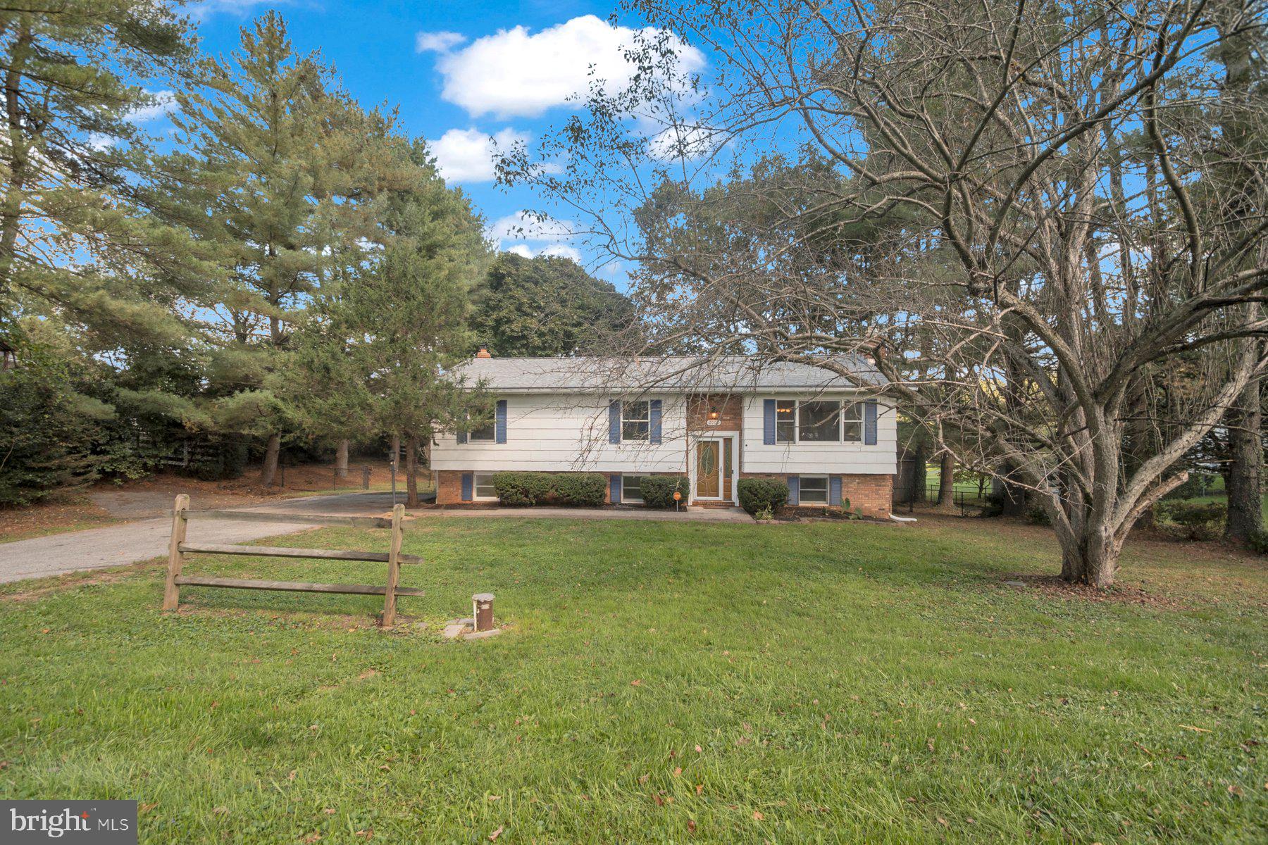 2002 Deer Park Road Finksburg, MD 21048 - Photo 30 of 36 a front view of a house with a garden
