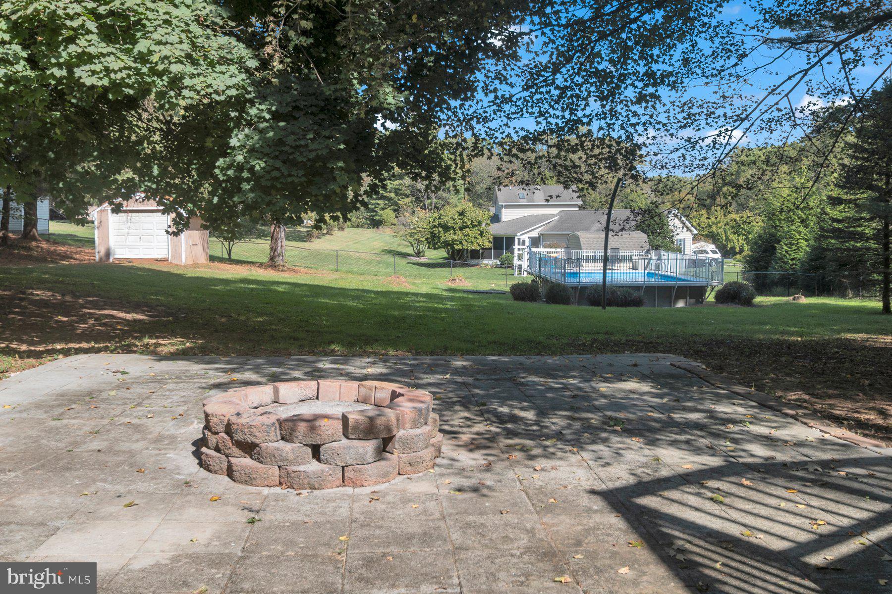 2002 Deer Park Road Finksburg, MD 21048 - Photo 32 of 36 a backyard of a house with lots of green space