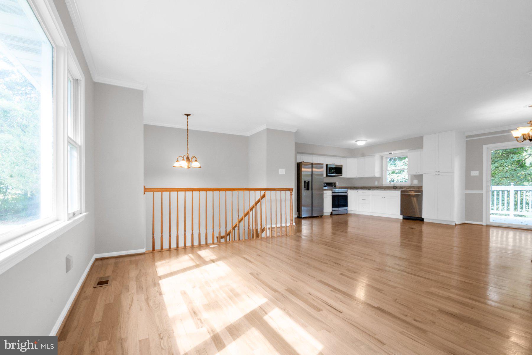 2002 Deer Park Road Finksburg, MD 21048 - Photo 9 of 36 a view of an empty room with wooden floor and a window