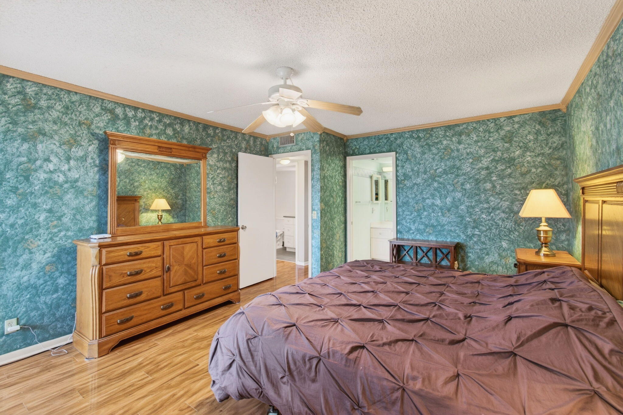 3007 Yarmouth C Boca Raton, FL 33434 - Photo 24 of 75 a bedroom with a bed and a dresser