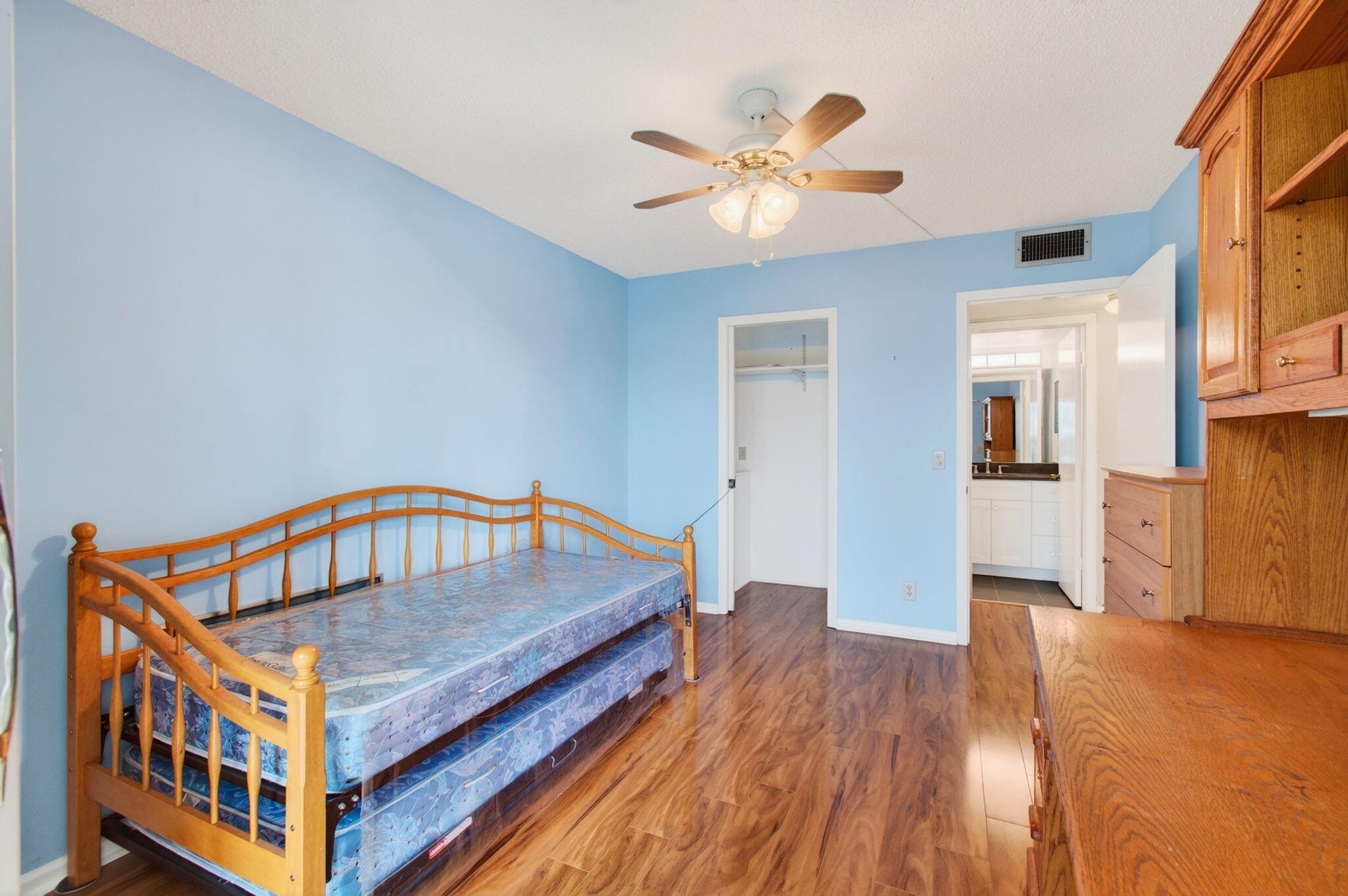 3007 Yarmouth C Boca Raton, FL 33434 - Photo 30 of 75 a view of a livingroom with wooden floor and staircase