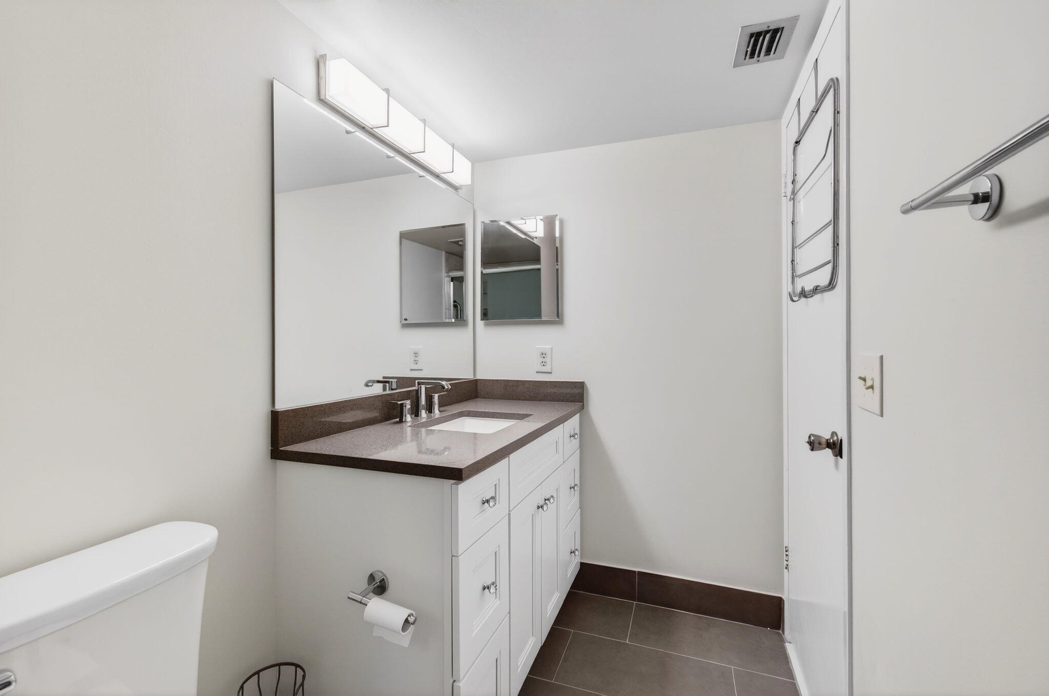 3007 Yarmouth C Boca Raton, FL 33434 - Photo 37 of 75 a bathroom with a sink and a mirror