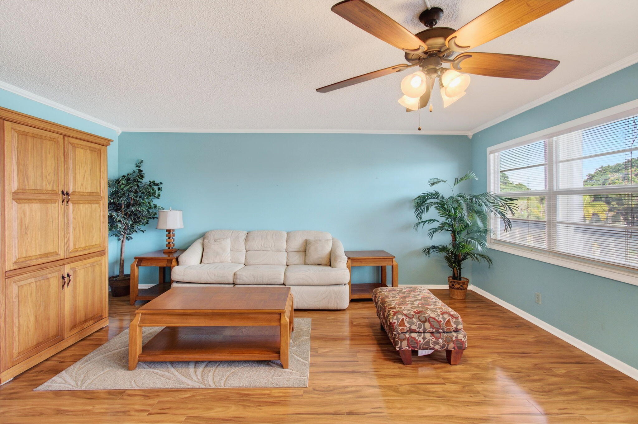 3007 Yarmouth C Boca Raton, FL 33434 - Photo 10 of 75 a living room with furniture and a potted plant