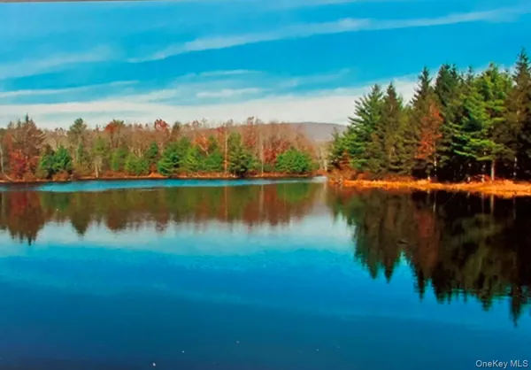a view of lake with green space