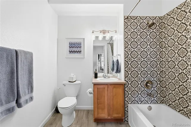 a bathroom with a toilet and a sink