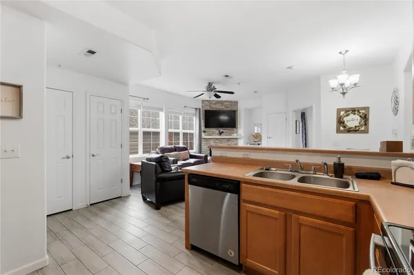 a kitchen with a stove and a sink
