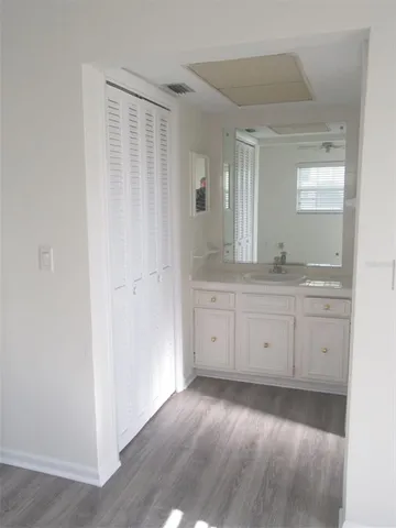 a view of a double vanity sink and mirror