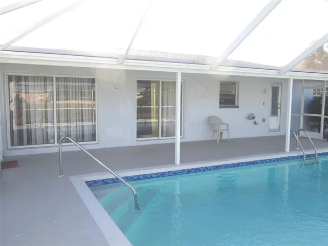 a view of a room with a large window