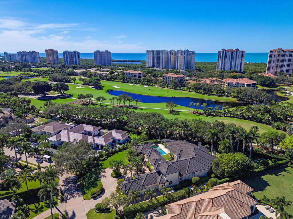 6955 Verde Way Naples, FL 34108 - Photo 3 of 42 a view of a city and flowers around
