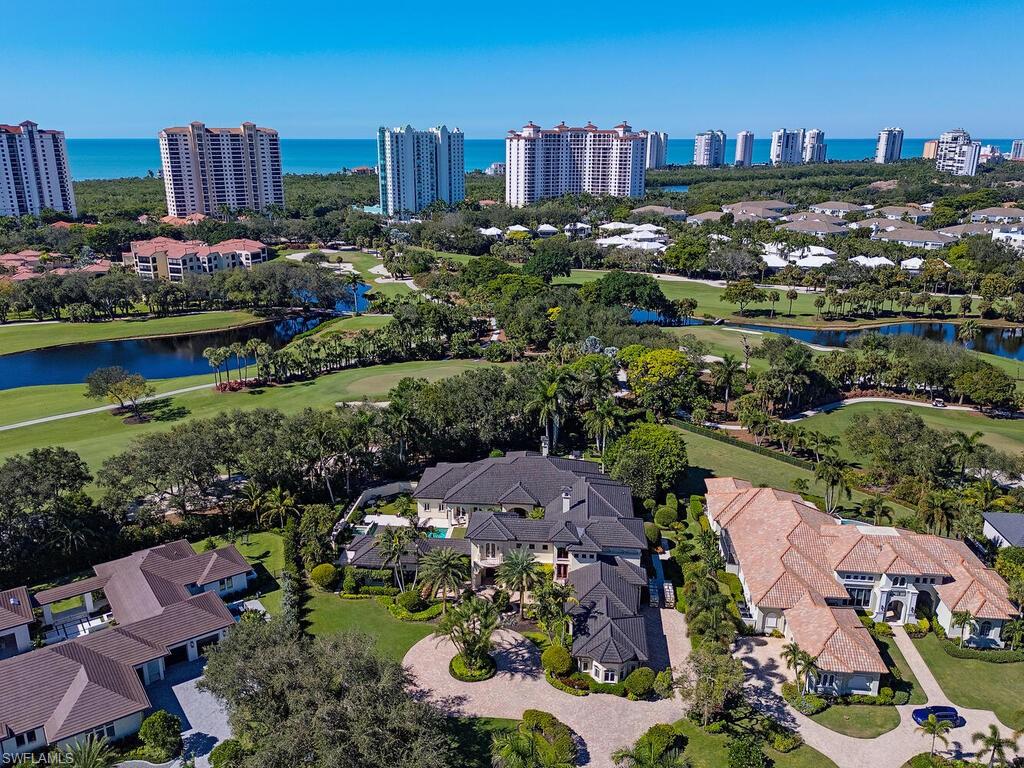 6955 Verde Way Naples, FL 34108 - Photo 4 of 42 a view of a city and lots of trees
