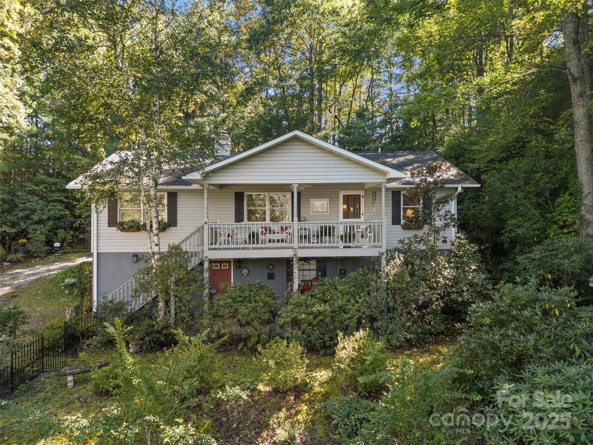 a house with trees in the background