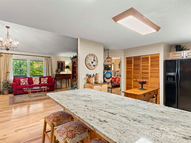 a view of a living room and dining room