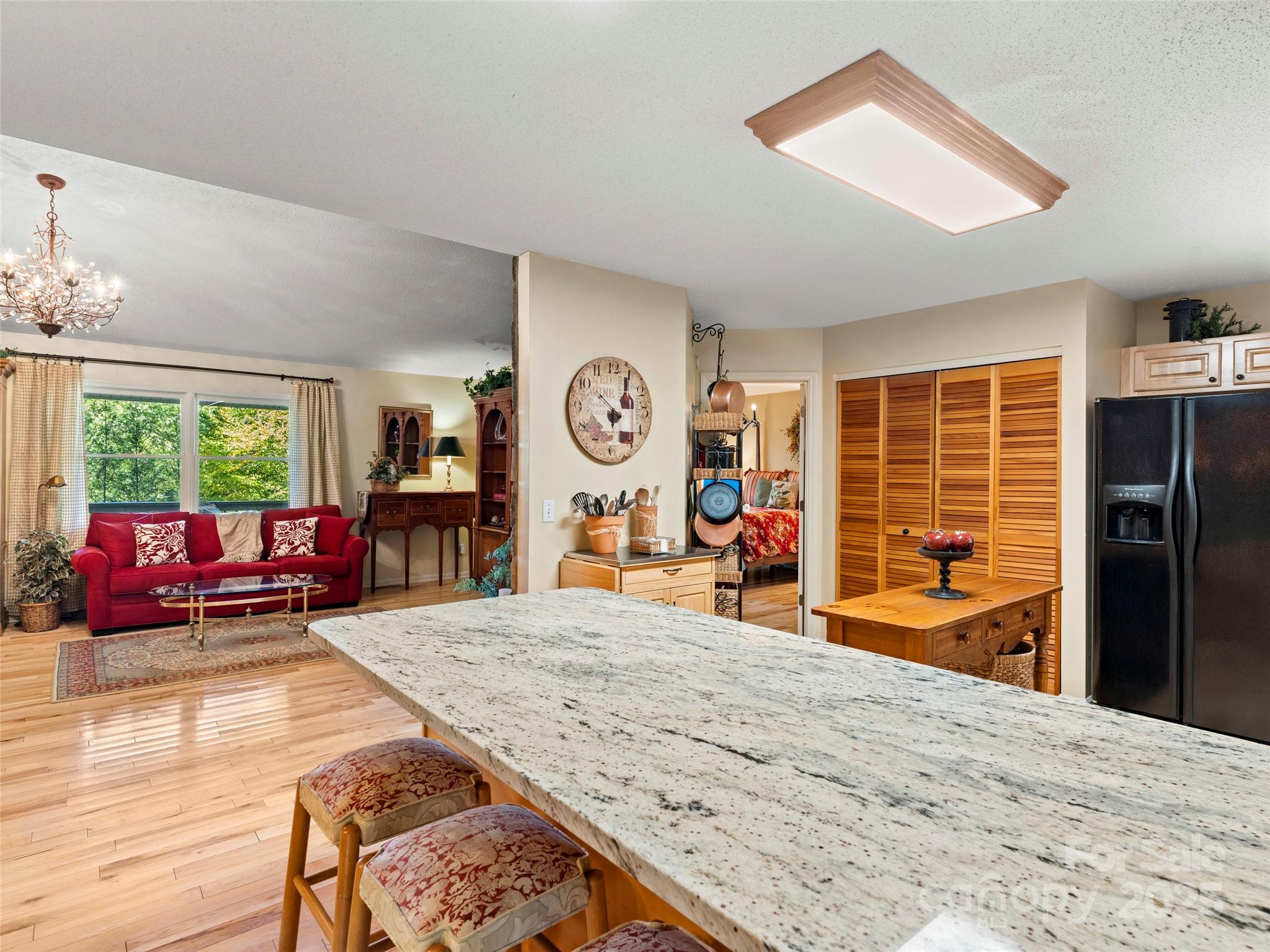 296 Ivy Ridge Circle Sylva, NC 28779 - Photo 11 of 42 a view of a living room and dining room