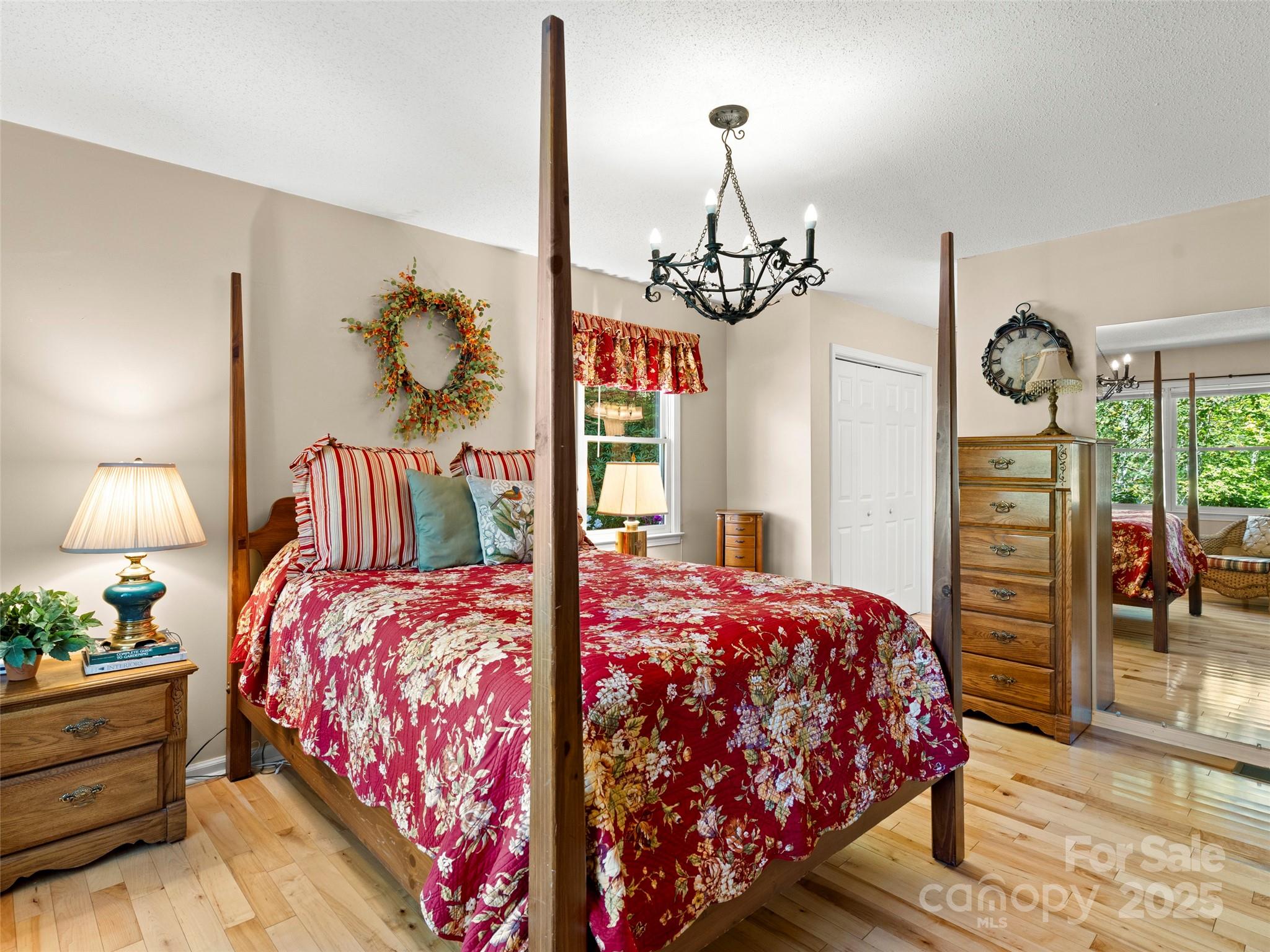 296 Ivy Ridge Circle Sylva, NC 28779 - Photo 17 of 42 a bedroom with bed and window