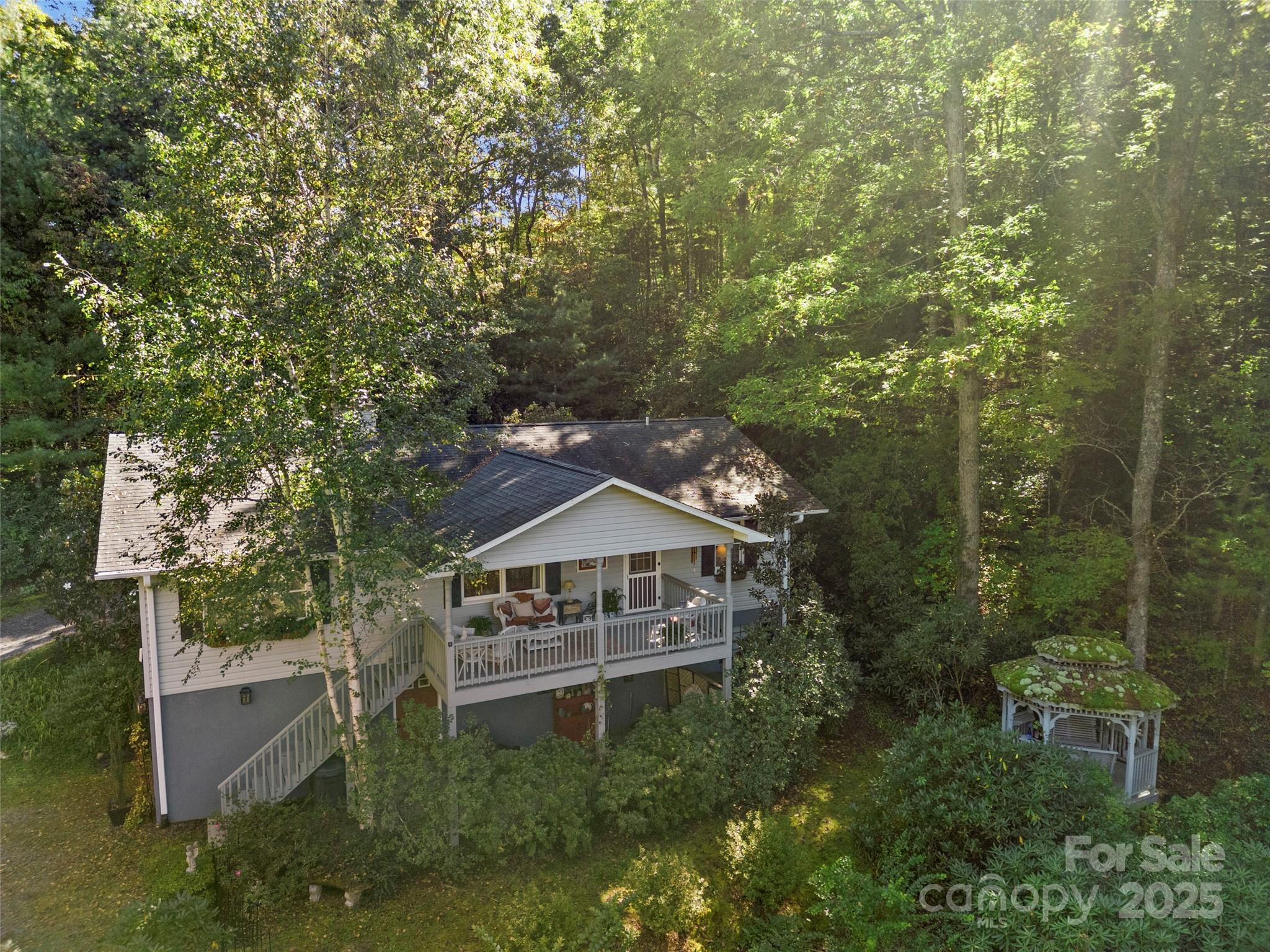 296 Ivy Ridge Circle Sylva, NC 28779 - Photo 2 of 42 a view of house with outdoor space and garden