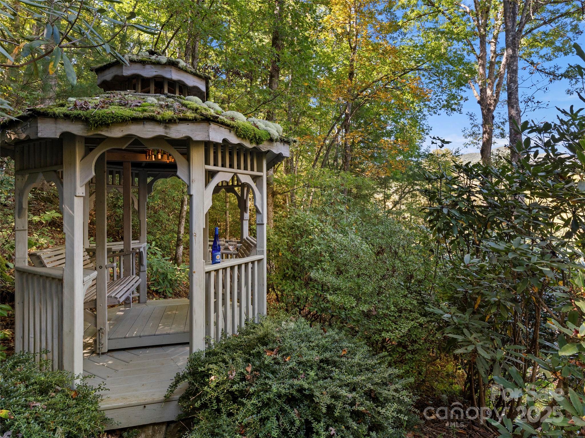 296 Ivy Ridge Circle Sylva, NC 28779 - Photo 30 of 42 a front view of a house with garden
