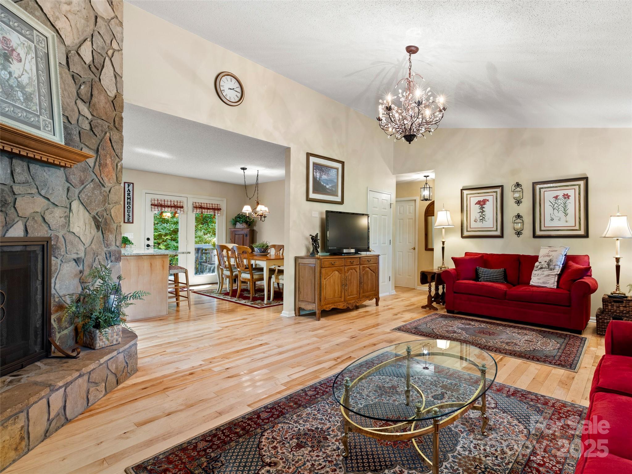 296 Ivy Ridge Circle Sylva, NC 28779 - Photo 5 of 42 a living room with furniture and a fireplace
