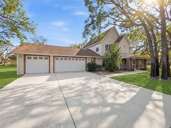 $384,999 | 132 Forest Wood Court, Spring Hill, FL 34609