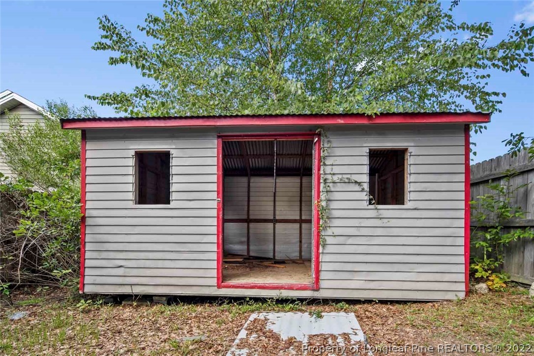 6573 Applewhite Road Fayetteville, NC 28304 - Photo 33 of 35 a view of a house with a yard