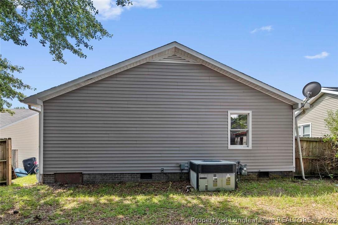6573 Applewhite Road Fayetteville, NC 28304 - Photo 35 of 35 a view of a house with a yard