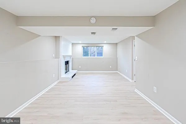a view of a livingroom with wooden floor