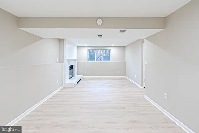 a view of a livingroom with wooden floor